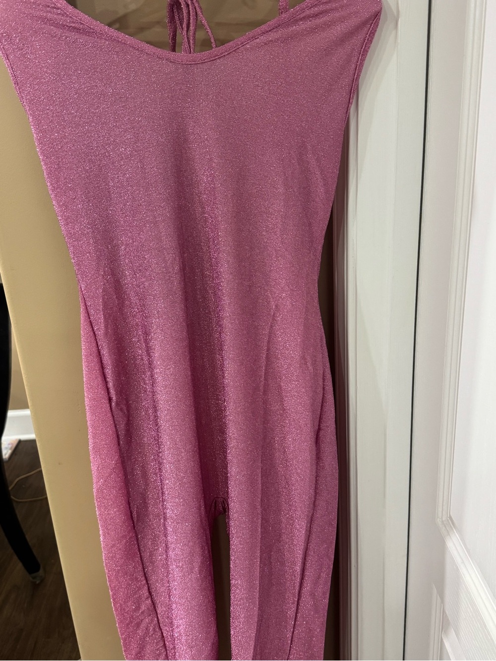 Shimmery Pink halter jumpsuit with v-neck and tie closure. (CL-3)